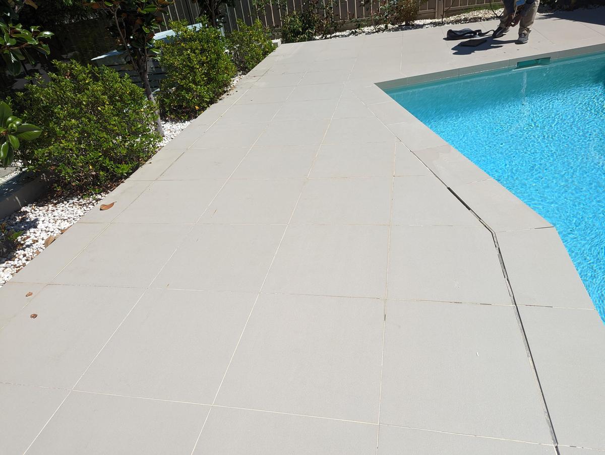 Swimming pool tile damage insurance investigation